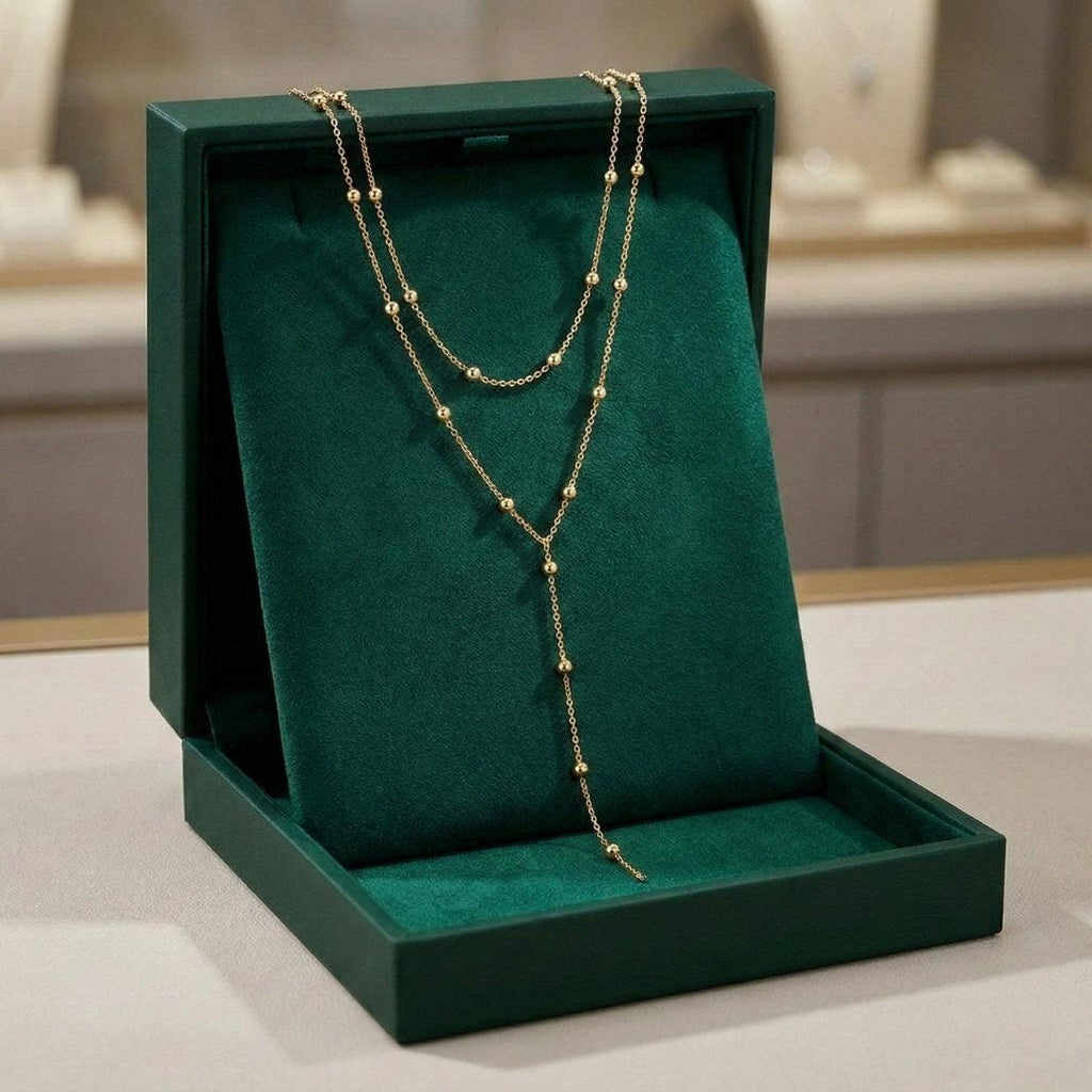 Goldene doppellagige lange Quastenperlenkette