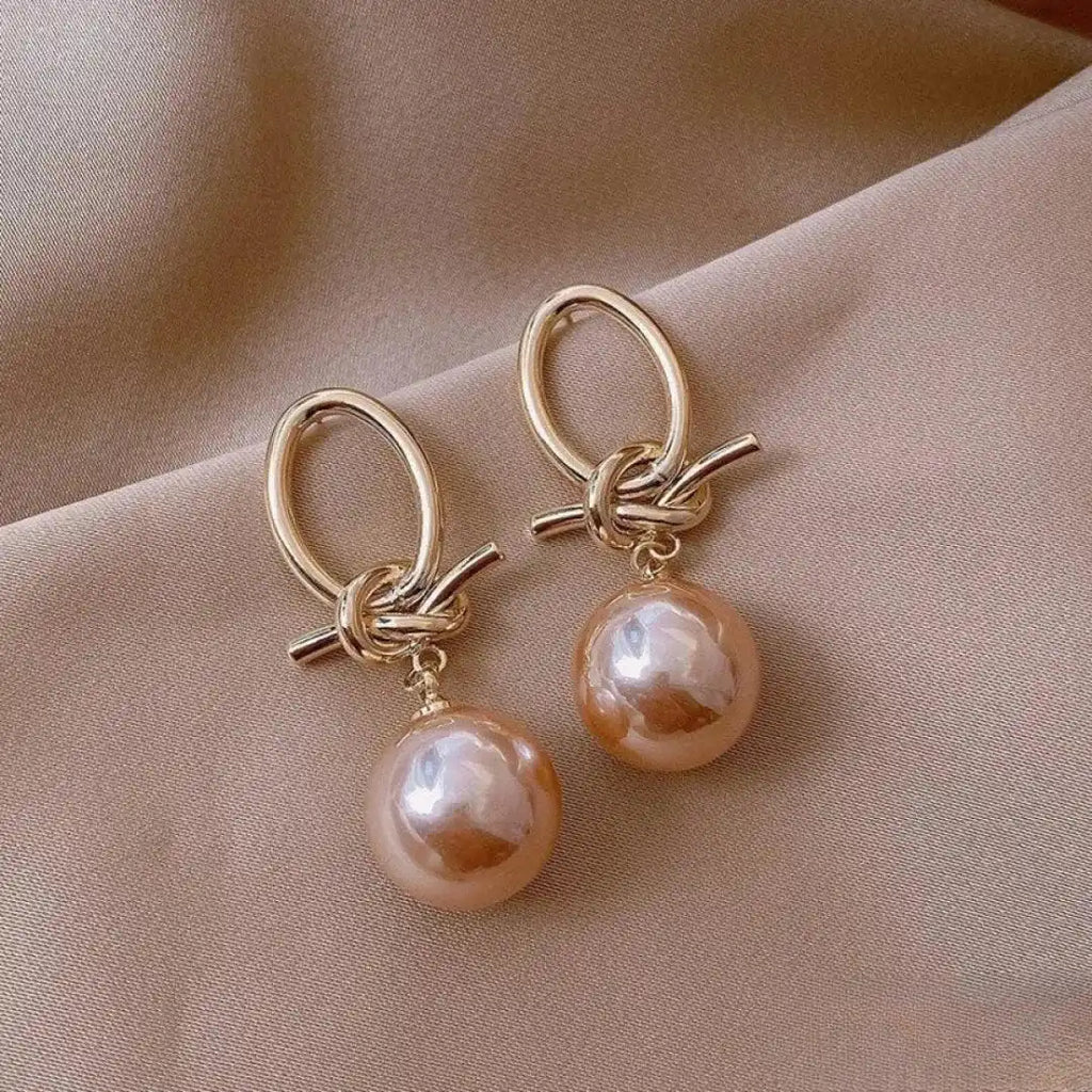 Elegante rosa Perlen-Ohrringe