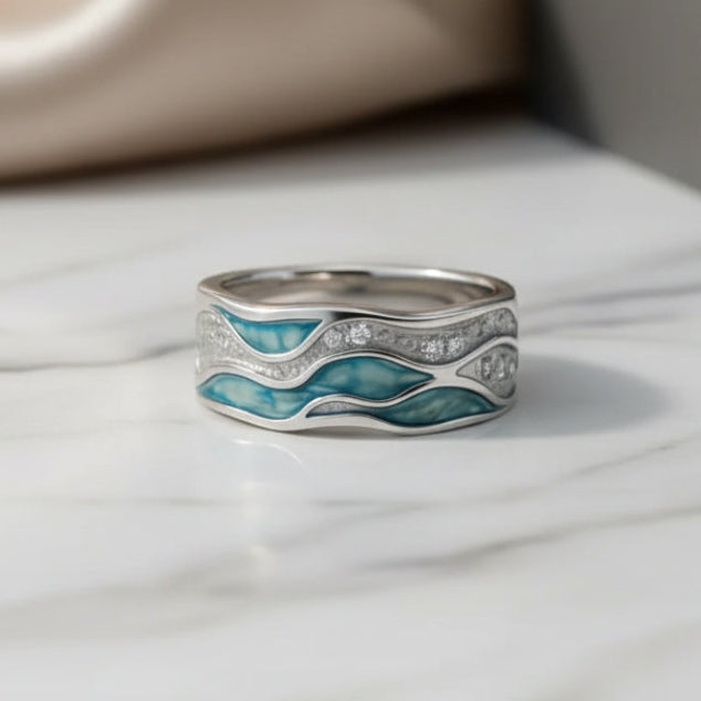 Ring – Türkis-Akzent im Wellendesign