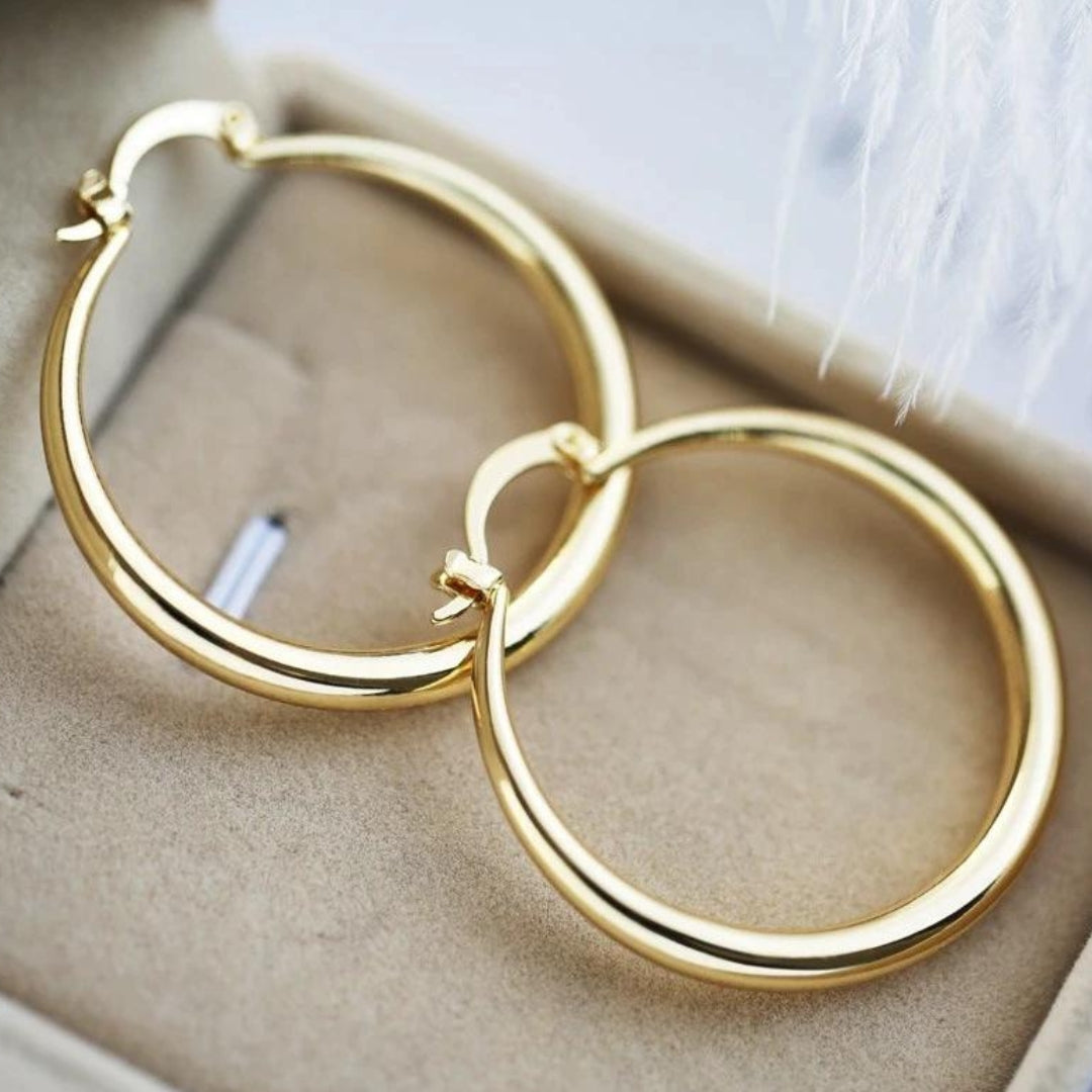 Goldene Statement-Ohrringe