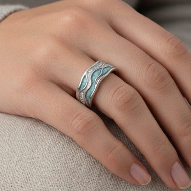 Ring – Türkis-Akzent im Wellendesign