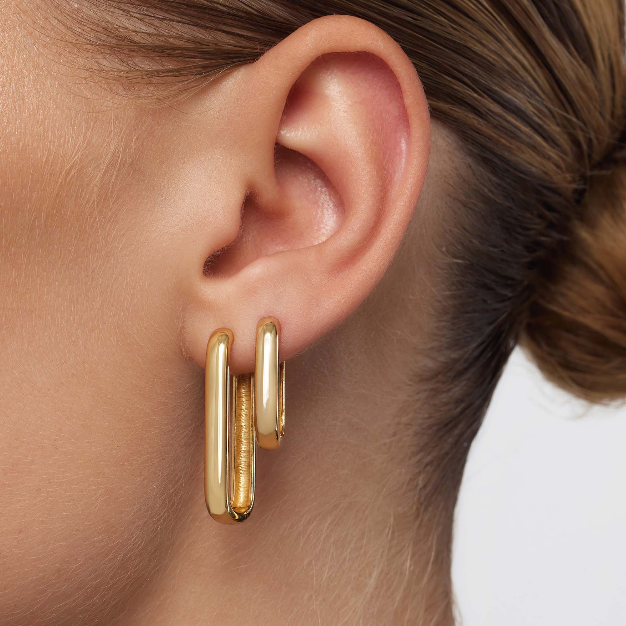 Elegante Ikone Goldene Creolen