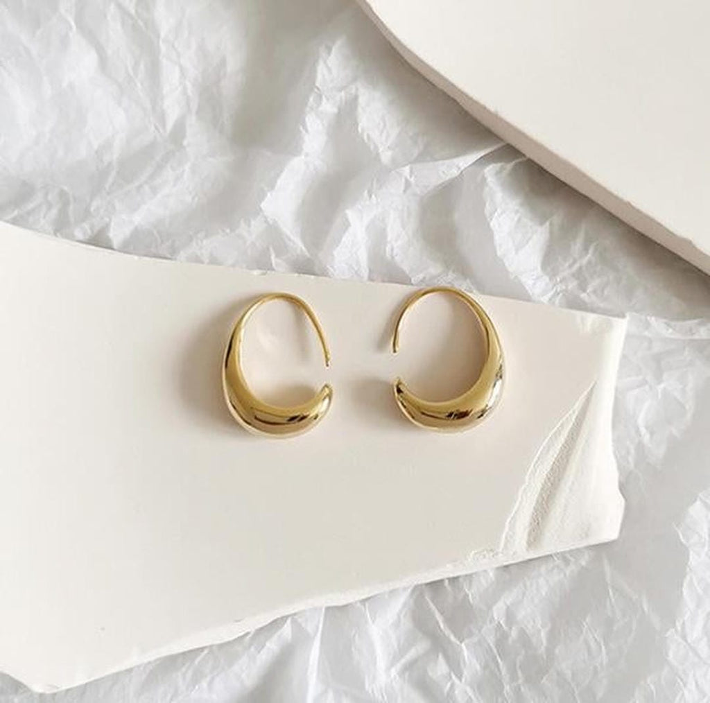 Ovale Hohrringe aus Gold und Silber