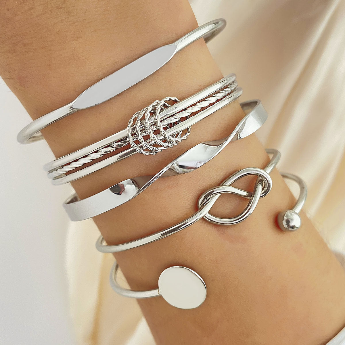 Knotetes Weißgold-Armband-Set