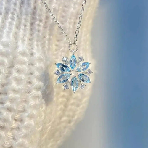 Blauer Schneeflocken-Anhänger aus Weißgold mit Blumenmotiv