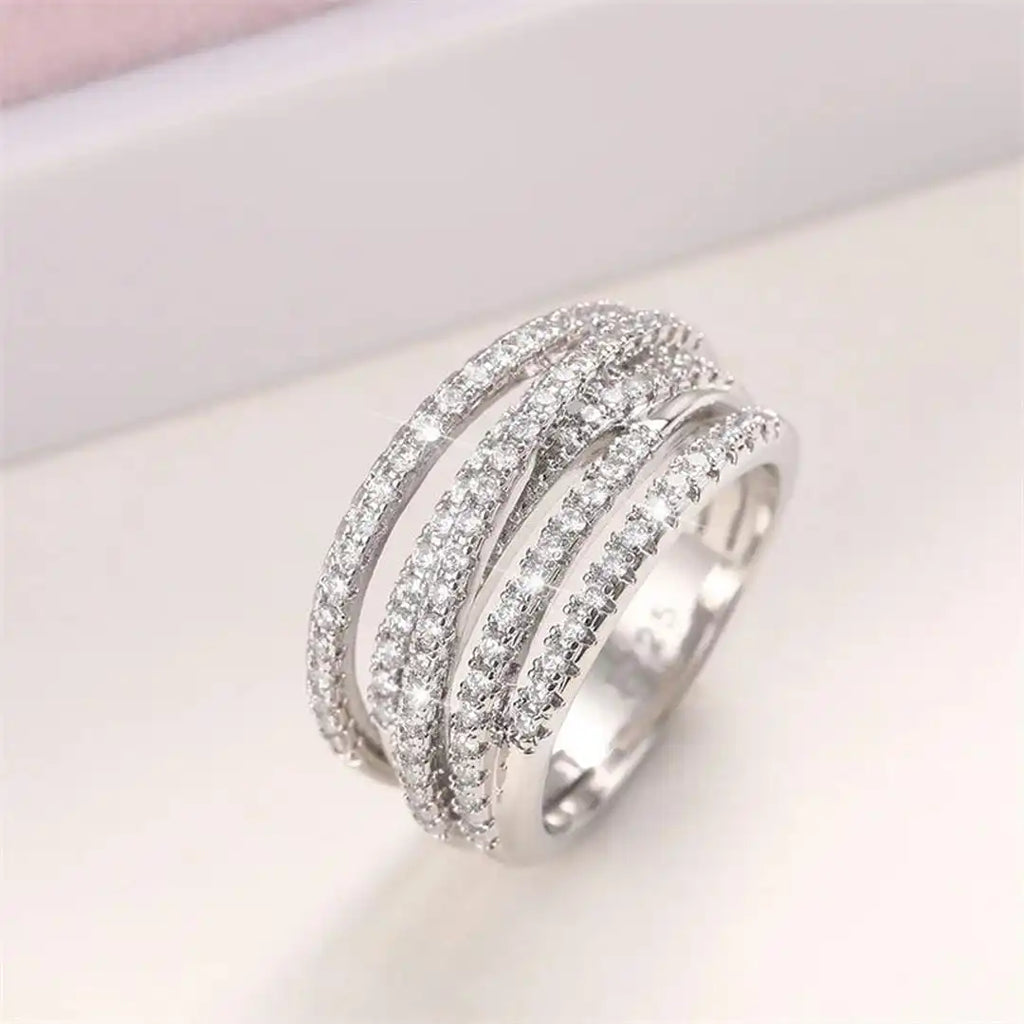 Schicht-Ring mit Zirkonia-Kreuz