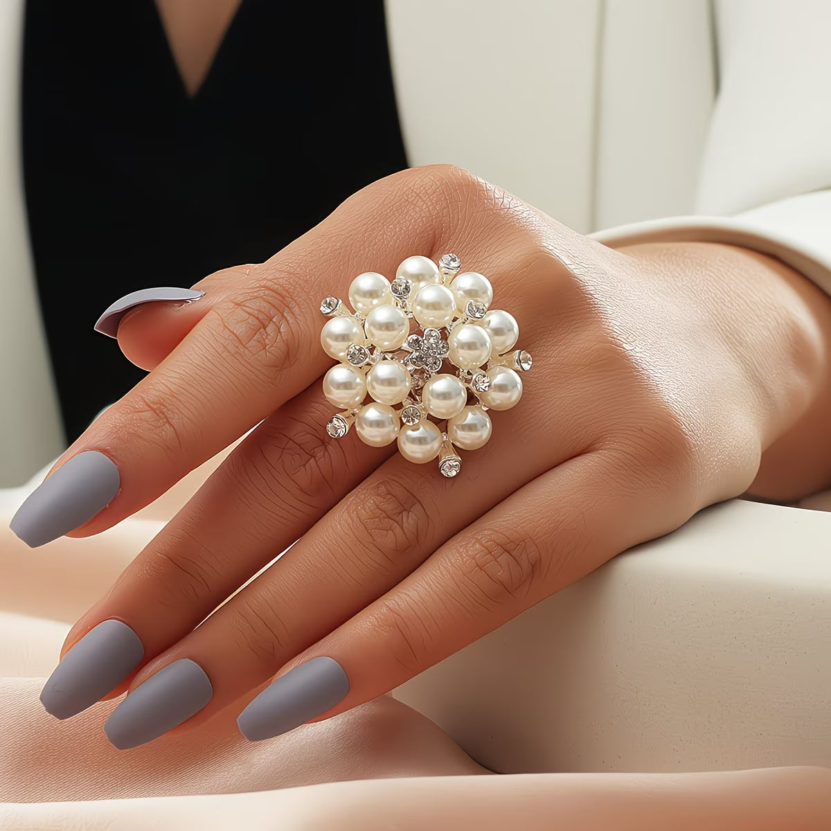 Eleganter Perlenblütenring