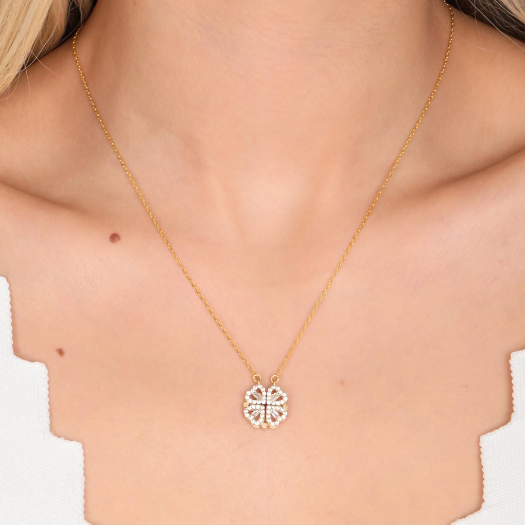 Goldenes Kleeblatt-Halsband mit Zirkonstein-Herzanhänger