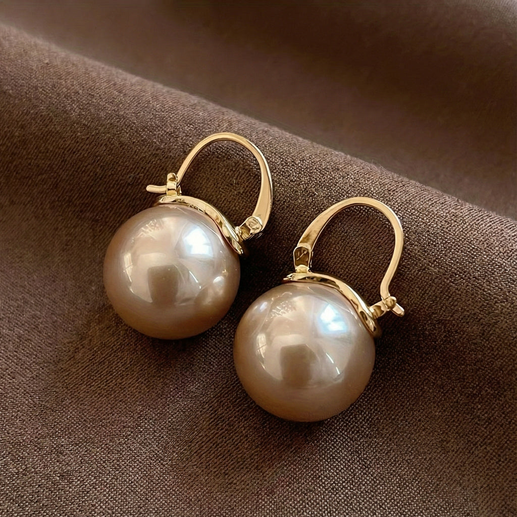 Elegante Perlenohrringe mit Anhänger