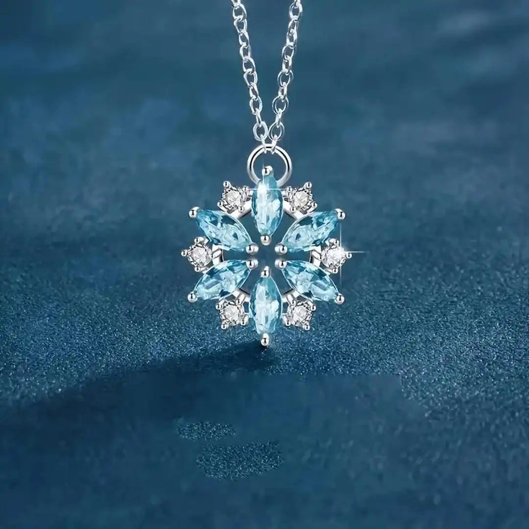 Blauer Schneeflocken-Anhänger aus Weißgold mit Blumenmotiv